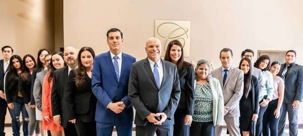Group photo of the attorneys and staff of Corona Law Firm, P.A.